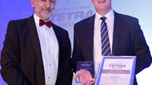 Sepura collecting award for Best Use Of Tetra In Utilities At International Tetra Awards