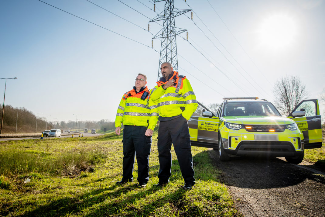 Highways England Officers with Motorway Background HR