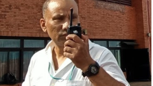 Airport User at Gautam Buddha With a Sepura SC20 Radio Close Up HR